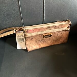 NWT rose gold Michael Kors wristlet never used 8”x5”x2”